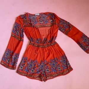 Dainty Hooligan orange paisley long sleeve romper